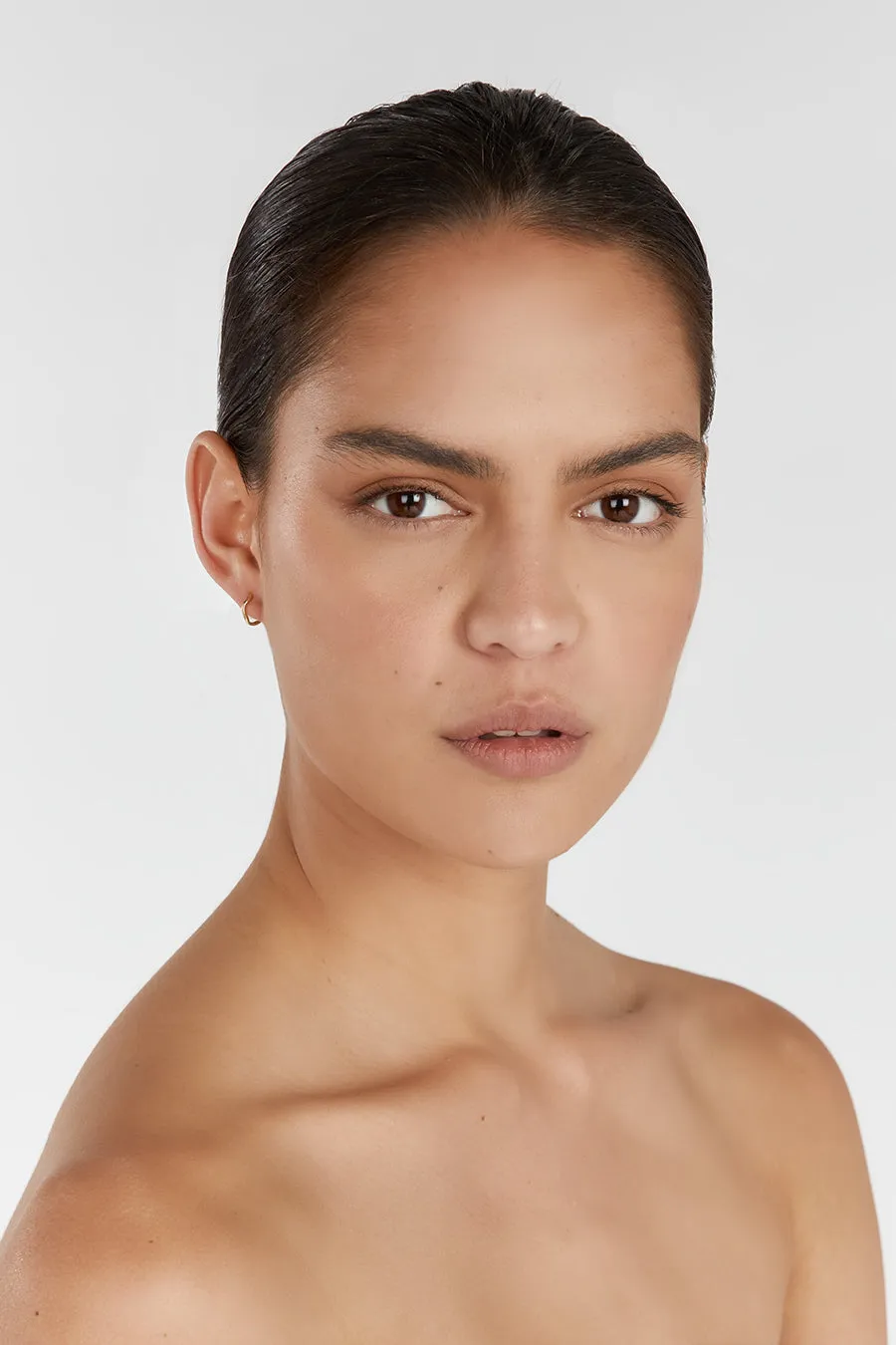 Dissh SAINT VALENTINE VERA WAVE GOLD HUGGIE EARRINGS